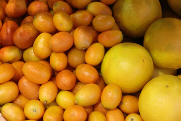 Top view of kumquat sold in the market. Kumquat, an organic citrus