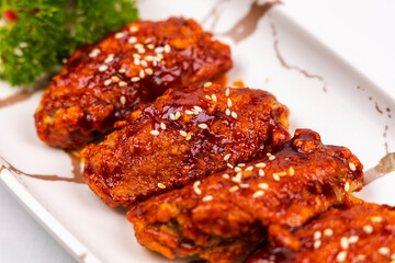 Korean fried chicken in spicy sauce ,  spicy sauce in Korean style