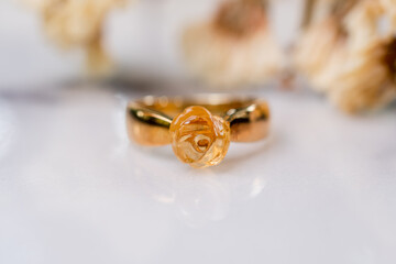 gold ring and citrine rose shape ring	
