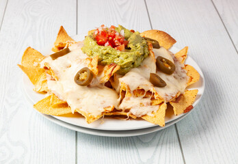 Nachos with cheese, guacamole and pico de gallo
