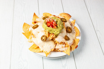 Nachos with cheese, guacamole and pico de gallo