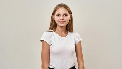 Portrait of caucasian teenage girl look at camera