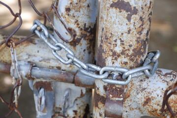 Close up of a chain that closes the door.