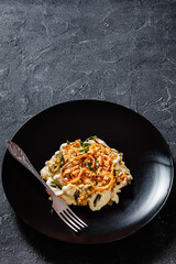 cheesy green bean casserole on plate, top view