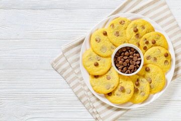 chocolate chip lemon yellow cookies on a plate