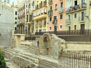 TARRAGONA, SPAIN - 06.07.2022: Tarragona Spain streetview of medieval houses near Roman Empre ruins