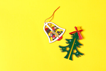 Christmas and New Year bell on yellow background
