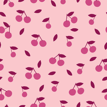 Seamless cherry pattern. Ripe cherry on a pink background. Fashionable print for wallpaper and textiles.