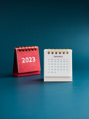 January 2023 calendar desk for the organizer to plan and reminder on blue background, vertical...