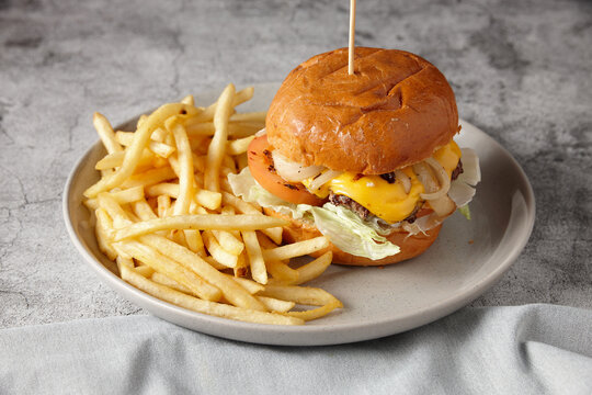 close up shot of original burger and chips