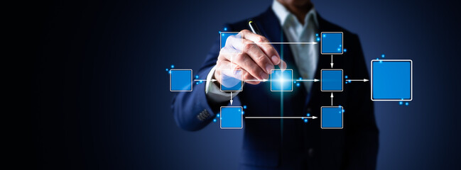 A man's left hand is holding a phone, while his right hand is holding a pencil, and his power is...