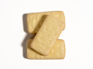 Chocolate bar on a white background. White chocolate.