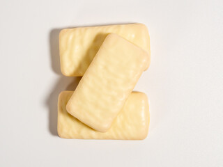 Chocolate bar on a white background. White chocolate.