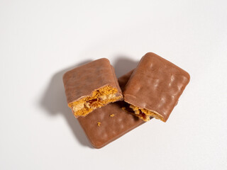 Chocolate bar on a white background. Chocolate with caramel.