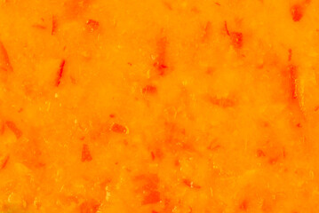 Sweet orange marmalade as background, closeup top view