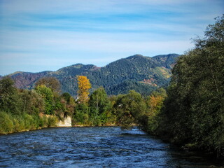 Beautiful banks of a mountain river in autumn