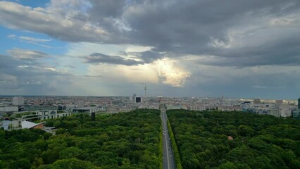 big sky nice clouds. Breathtaking aerial view flight panorama overview drone
of 17th of June Street Berlin Germany at summer day 2022. 4k marnitz Cinematic