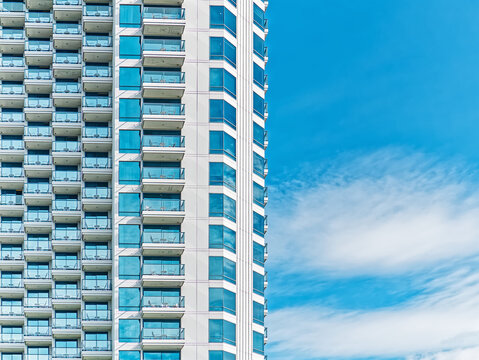 Modern Building Against Blue Cloudy Sky