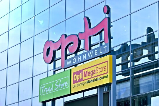 Neu-Ulm, Germany - October, 03, 2022: Opti Wohnwelt Furniture Store Exterior Logo. 