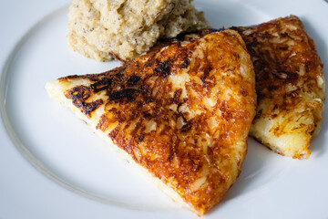 Frico Friulano Italian Montasio Cheese and Potato Rosti with Polenta a Traditional Dish from the...