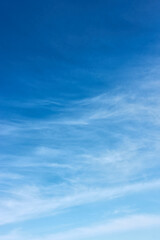 Blue sky with white fleecy clouds