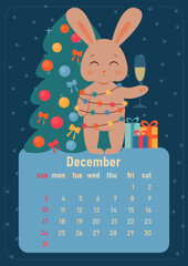 Calendar 2023 for december. Year of rabbit, symbol of new year. The week starts on Sunday. A cute rabbit turned into garland with colored light bulbs, stands near Christmas tree with gifts with glass 