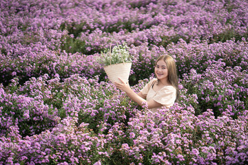 Traveler Asian woman travel in a flower garden.