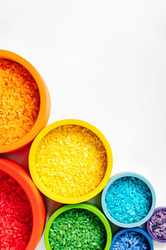 Bowls In Rainbow Colors With Colored Rice. Sensory Bin Toddler. Montessori Material. Learning Colors. Scooping And Pouring Activity For Kids. Games For Learning And Development Of Child