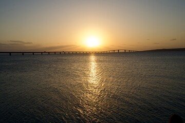 The sun setting behind the Irabu Bridge