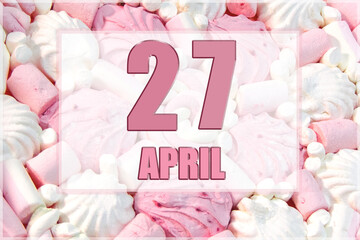 calendar date on the background of white and pink marshmallows. April 27 is the twenty-seventh day of the month