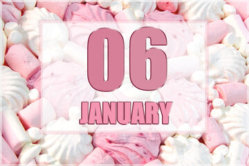 calendar date on the background of white and pink marshmallows.  January 6 is the sixth day of the month