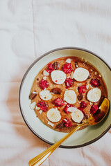 Healthy breakfast oatmeal bowl and fruit