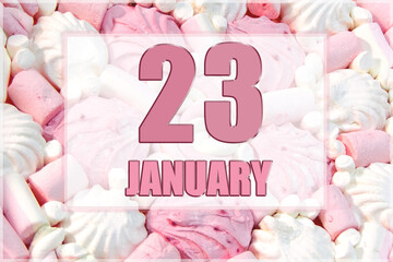 calendar date on the background of white and pink marshmallows. January 23 is the twenty-third  day of the month