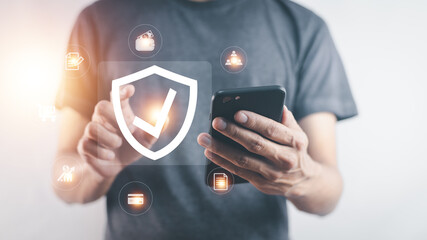 Man using mobile phone buy insurance online