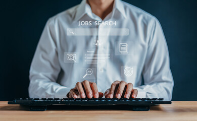 Man using keyboard to search for new jobs online from new graduate recruitment sites. recruiting with online technology concept.