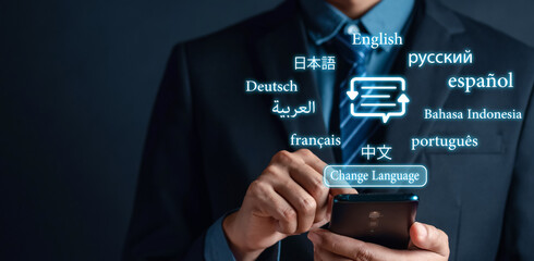 Businessman using smartphone for translation or translate on the mobile app worldwide language...