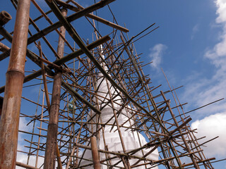 Scaffolding as Safety  Traditional Asian scaffolding made of bamboo Safety Equipment on a Construction Site