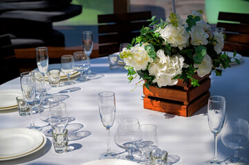 Served tables at beautiful interior of cafe or restaurant