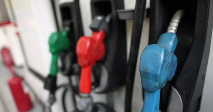 Various petrol pistol at a gas station