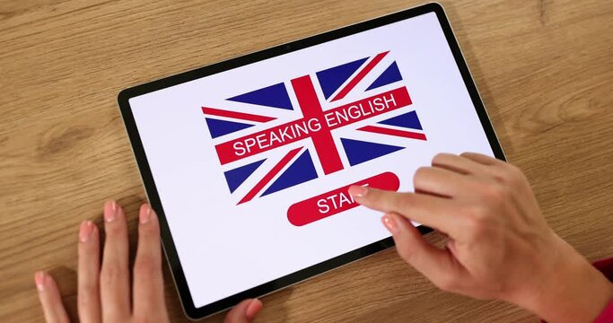 Learn english interface in hands holding tablet with english learning