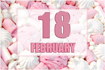 calendar date on the background of white and pink marshmallows. February 18 is the eighteenth day of the month
