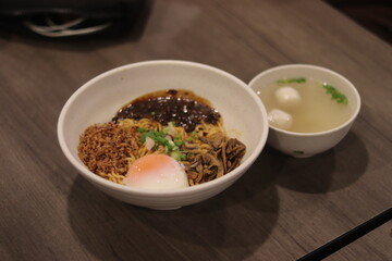 Chili pan mee on the wood table
