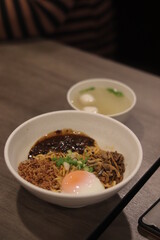 Chili pan mee on the wood table