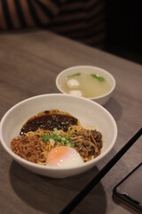 Chili pan mee on the wood table
