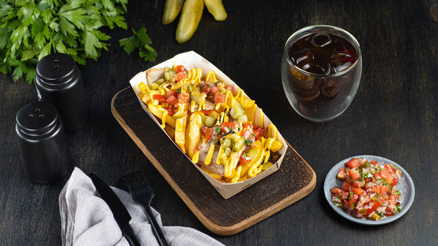 A View Of A Plate Of Carne Asada French Fries.