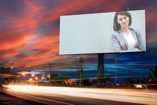 Portrait Of Young Attractive Happiness Beautiful Woman Advertise On Billboard Blank For Outdoor Advertising Poster Or Blank Billboard For Advertisement	
