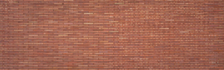 panorama orange brown old brick wall panel exterior design abstract background.for construction material backdrop,vintage or retro wallpaper design.