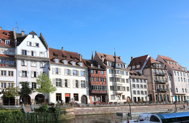 Buildings .in Strasbourg in France and boat on ILL RIVER