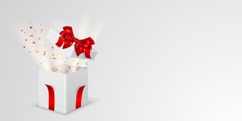 Festive illustration with open white gift box with red ribbons and bow. Pieces of serpentine and rays of light fly out of it