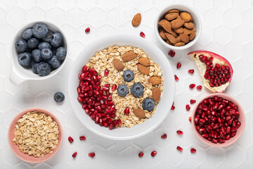 healthy eating concept with whole grains fresh fruit and almonds.